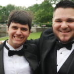 Two young men in tuxes